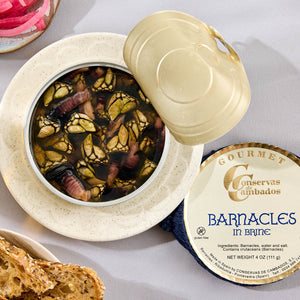 An opened tin of Conservas de Cambados Barnacles in Brine