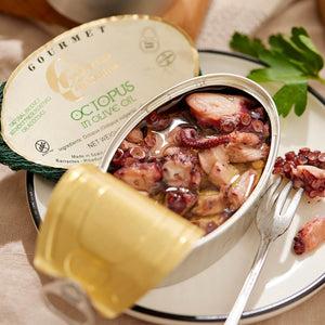An opened tin of Conservas de Cambados Octopus in Olive Oil 