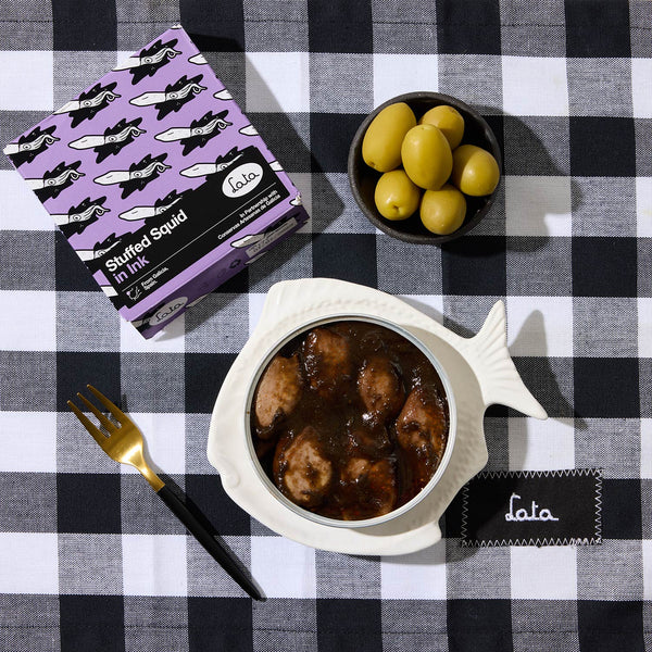 An opened tin of Lata Stuffed Squid in Ink