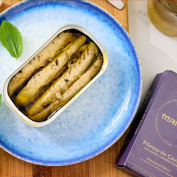 An opened tin of Manná Mackerel Fillets in Olive Oil and Lemon-Thyme