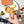 Load image into Gallery viewer, A person spreading a helping of Manná Salmon pate on a cracker