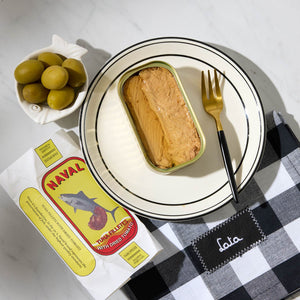 An opened tin of Naval Tuna Fillets with Dried Tomato