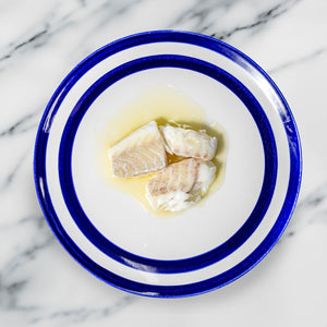 Artesanos Alalunga European Hake Loins with Olive Oil - beautifully served