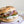 Load image into Gallery viewer, A cream cheese bagel with cucumber and the Seed to Surf Celery root whitefish
