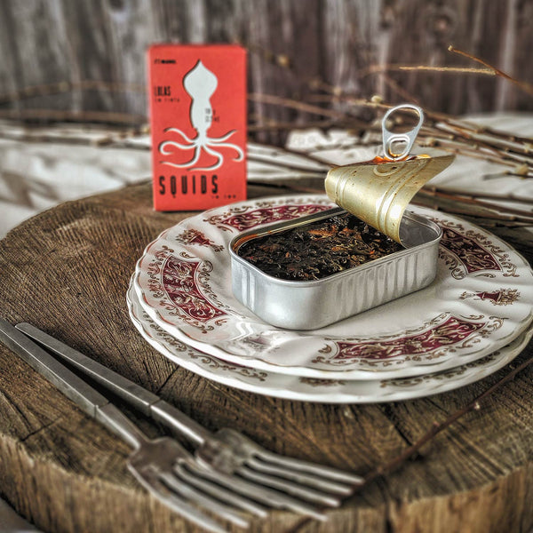 Ati Manel Squids in Ink in an opened tin