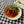Load image into Gallery viewer, Portomuiños Peppers with Sweet Kombu served beautifully