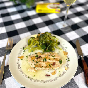 Branzino Al Ajillo with sautéed broccoli