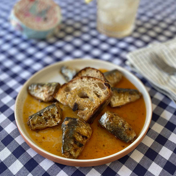 Güeyu Mar Chargrilled Sardine Tails in Pickled Sauce served with toasted bread