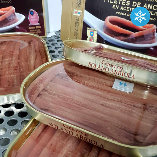 A group of tins of Solano-Arriola Extra Large Anchovy Fillets in Olive Oil