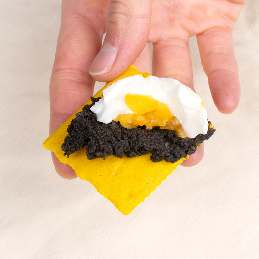 José Gourmet Cuttlefish in Ink with Shrimp Pate - served on a cracker