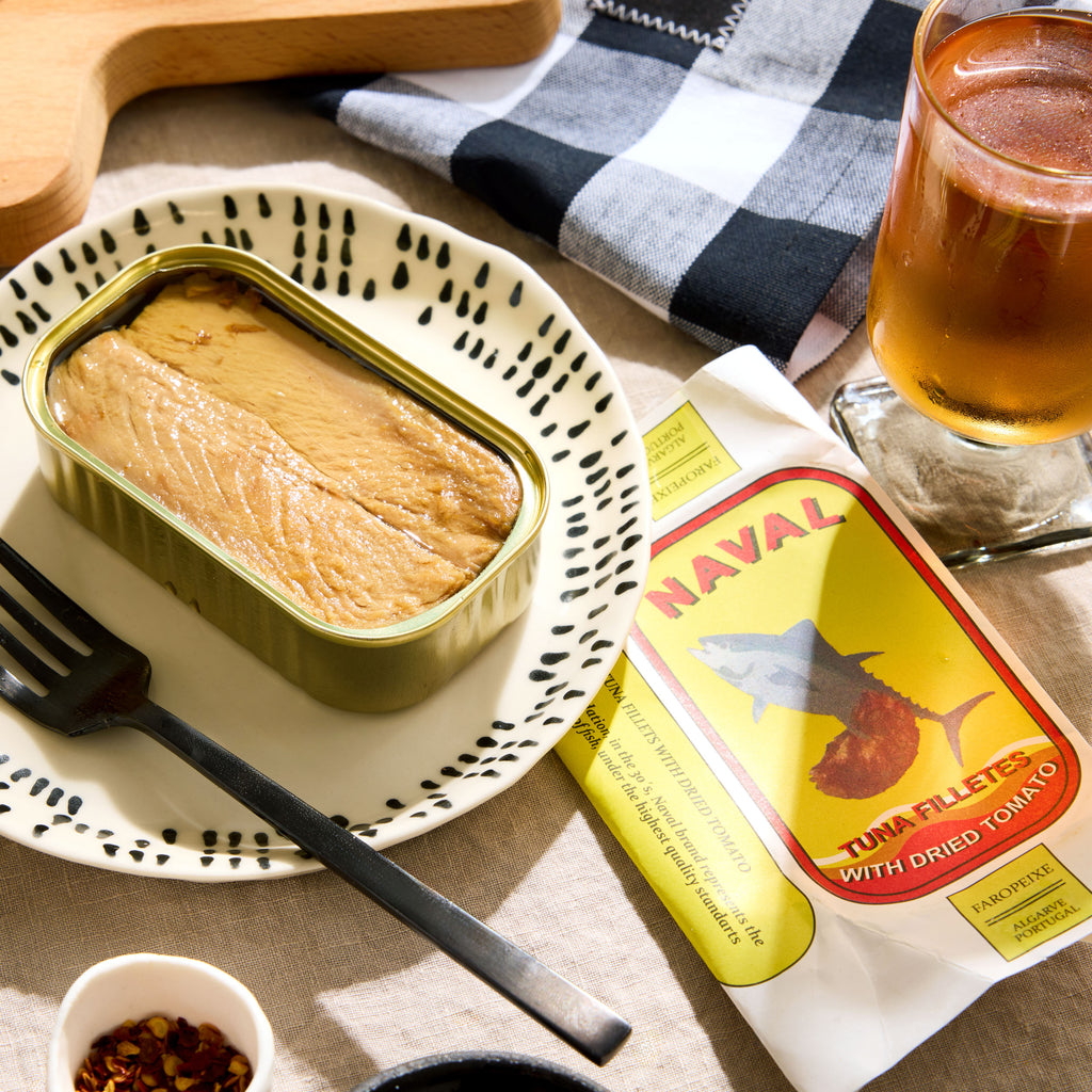 An opened tin of Naval Tuna Fillets with Dried Tomato
