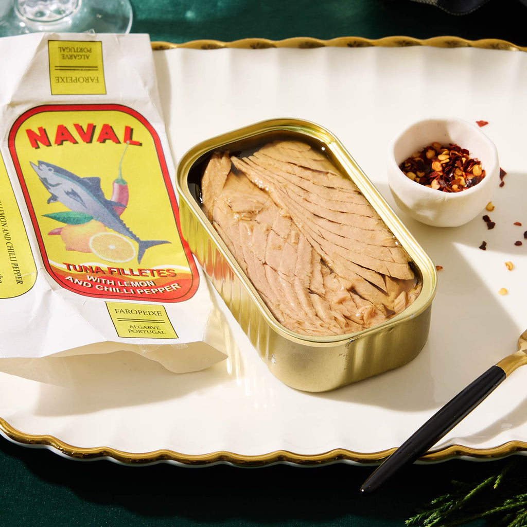 An opened tin of Naval Tuna Fillets with Lemon and Chili Pepper