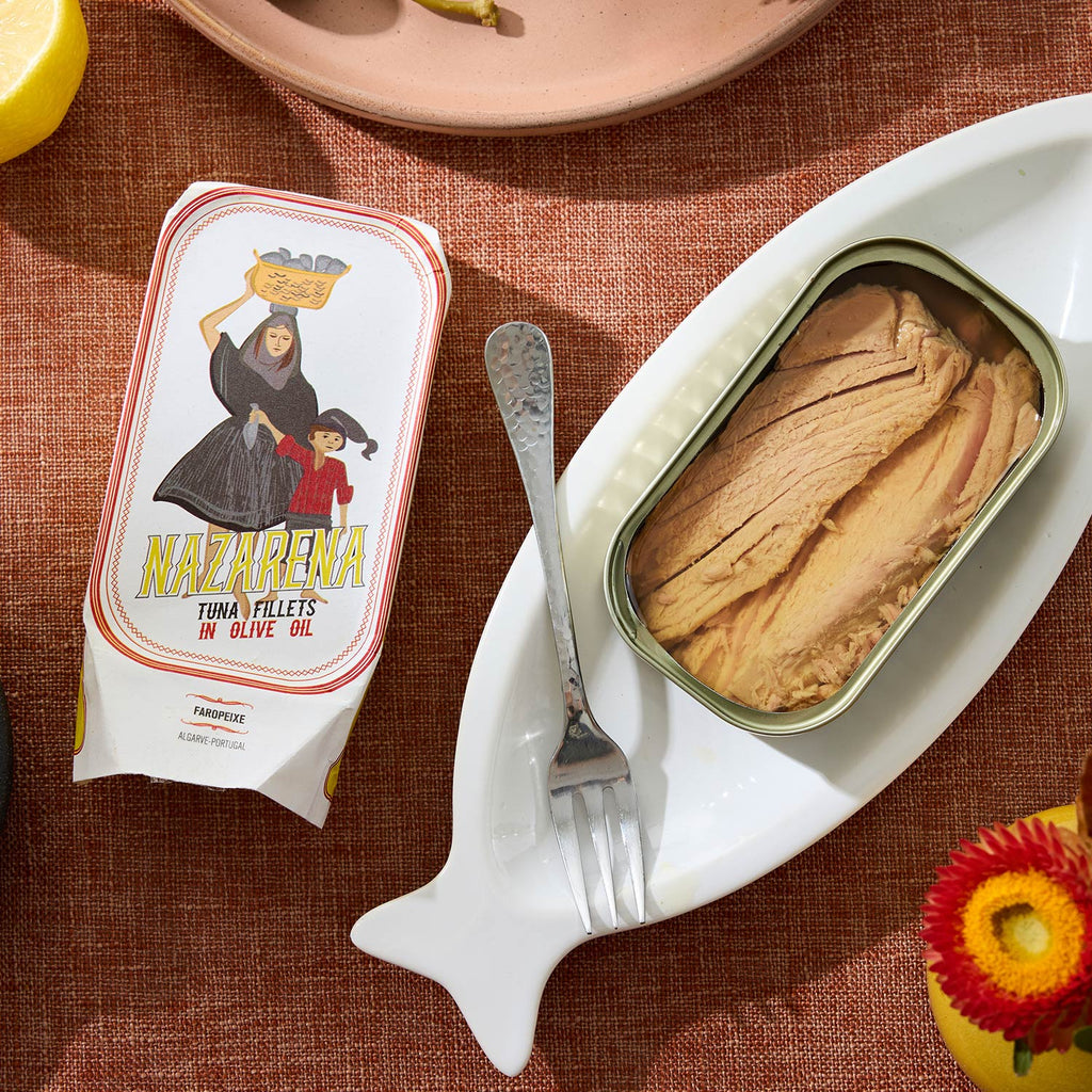 An opened tin of Nazarena Tuna Fillets in Olive Oil
