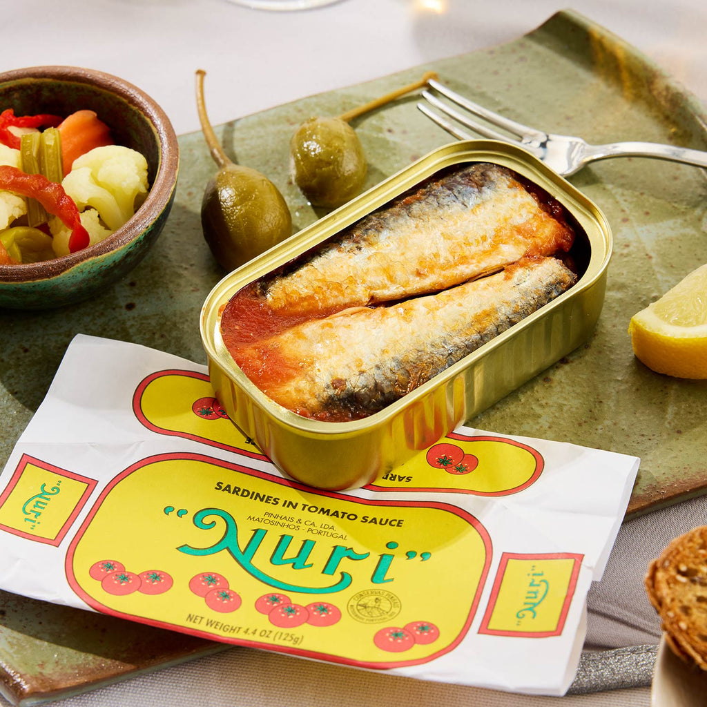 An opened tin of Nuri Sardines in Tomato Sauce