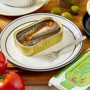 An opened tin of Nuri Spiced Mackerel in Olive Oil