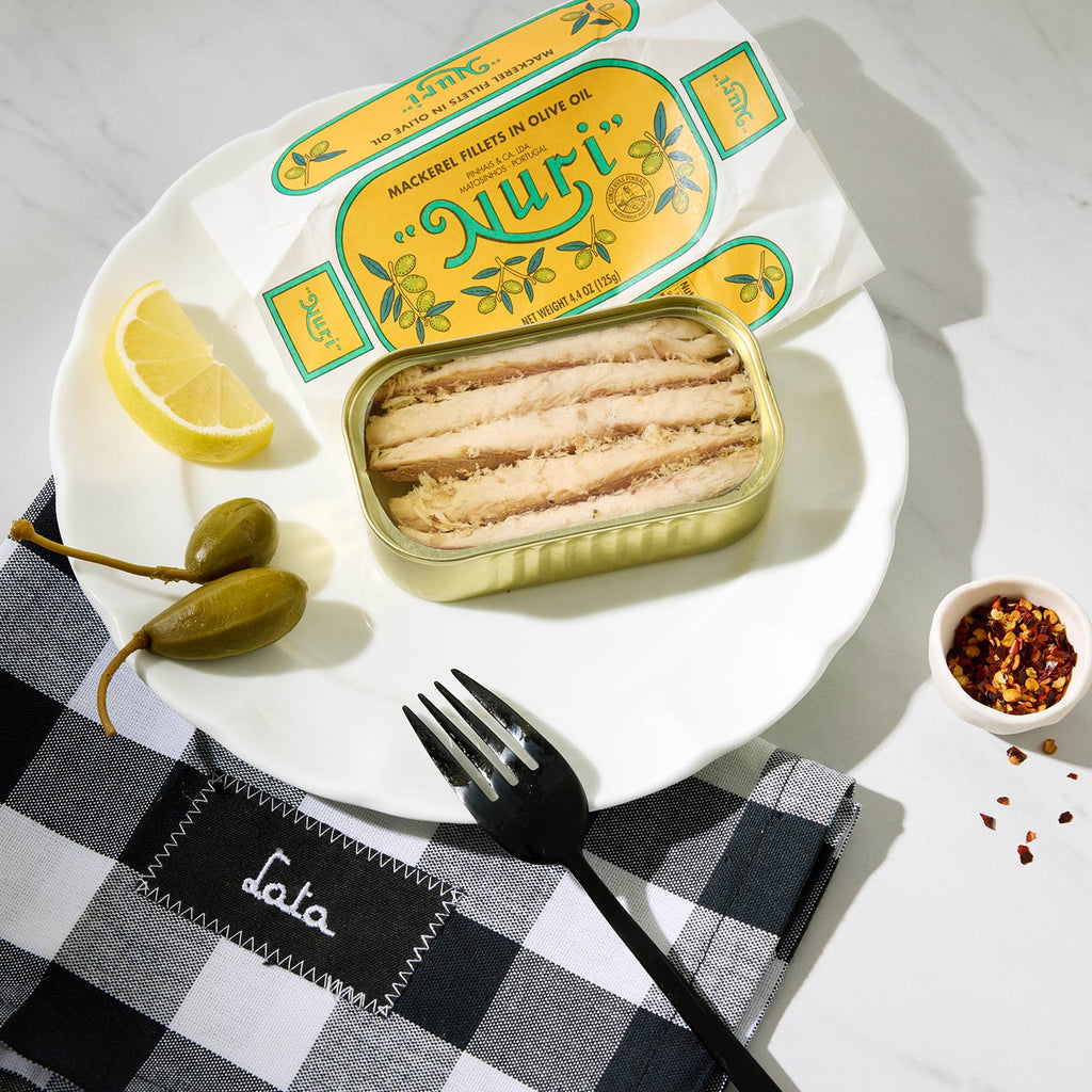 An opened tin of Nuri Mackerel Fillets in Olive Oil