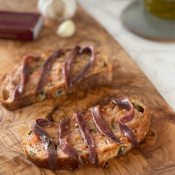 Solano-Arriola Anchovy Fillets in Olive Oil served on bread