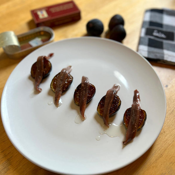 Solano-Arriola Anchovy Fillets in Olive Oil served on chopped figs