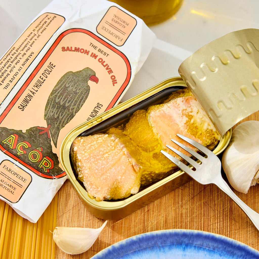 An opened tin of Açor Salmon in Olive Oil