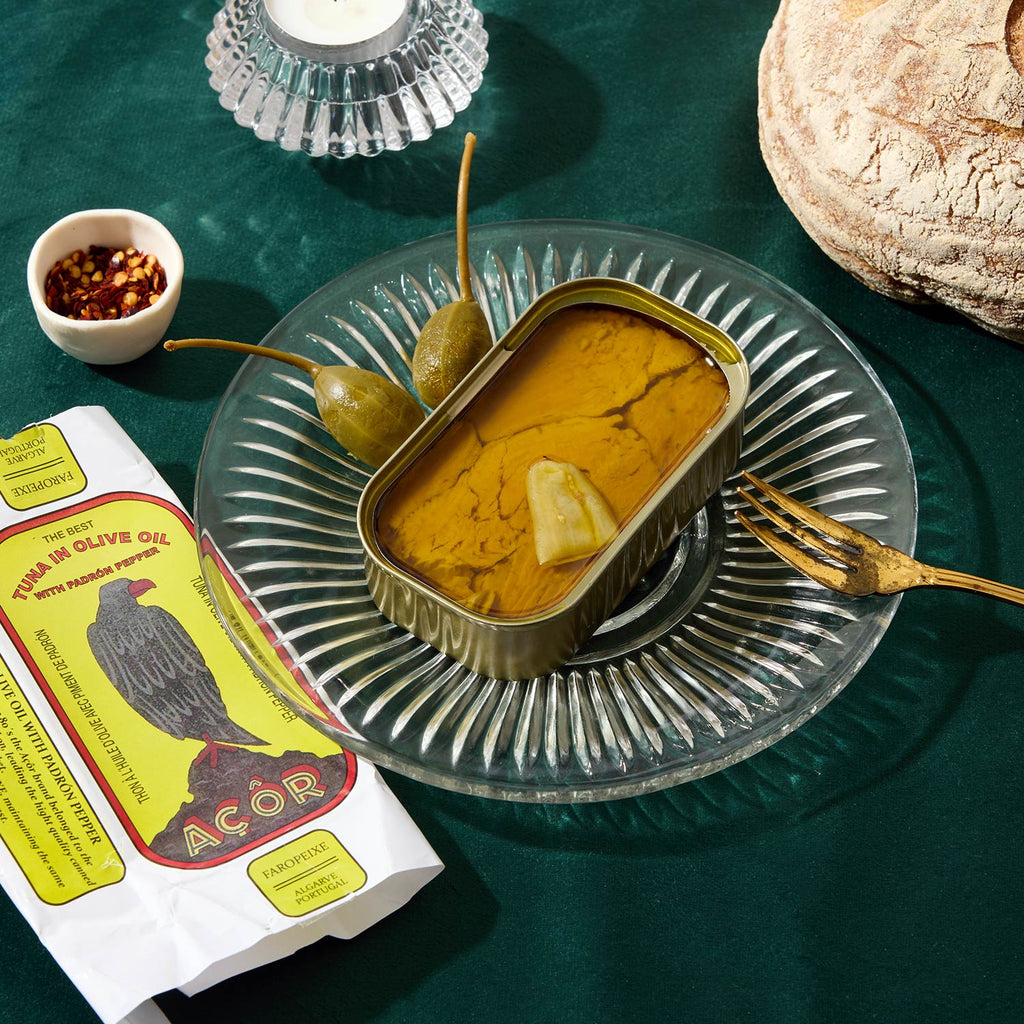 An opened tin of Açor Tuna in Olivee Oil with Padrón Pepper