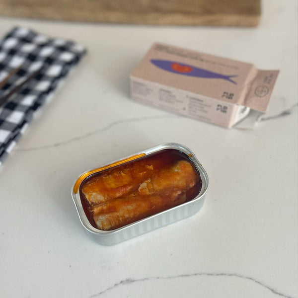 An opened tin of Maria Organic Sardines in Tomato Sauce