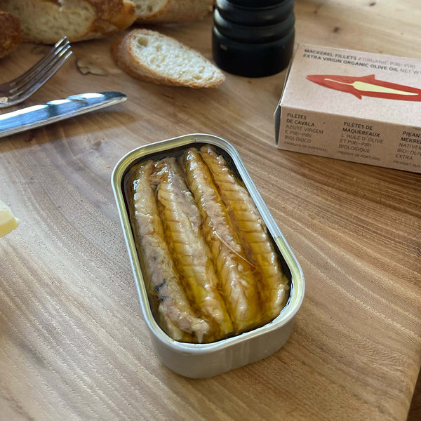 An opened tin of Maria Organic Spiced Mackerel Fillets