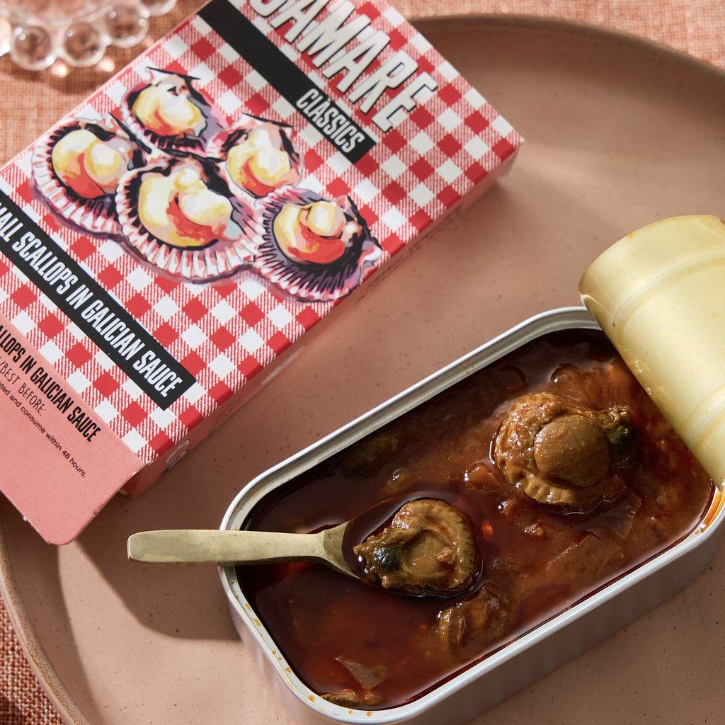 An opened tin of Samare Small Scallops in Galician Sauce