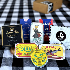 The 8 tins included in the Sardine Lovers Box