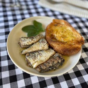 Güeyu Mar Chargrilled Sardine Tails served with toasted bread