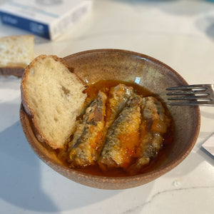 La Brújula Fried Sardines in Sauce served with bread